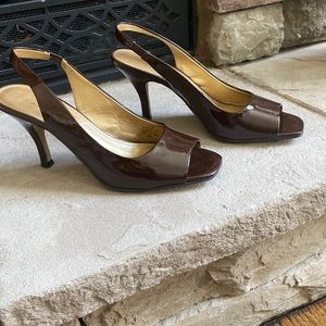Beautiful brown patent leather , open toe. Classy shoe, excellent condition!!